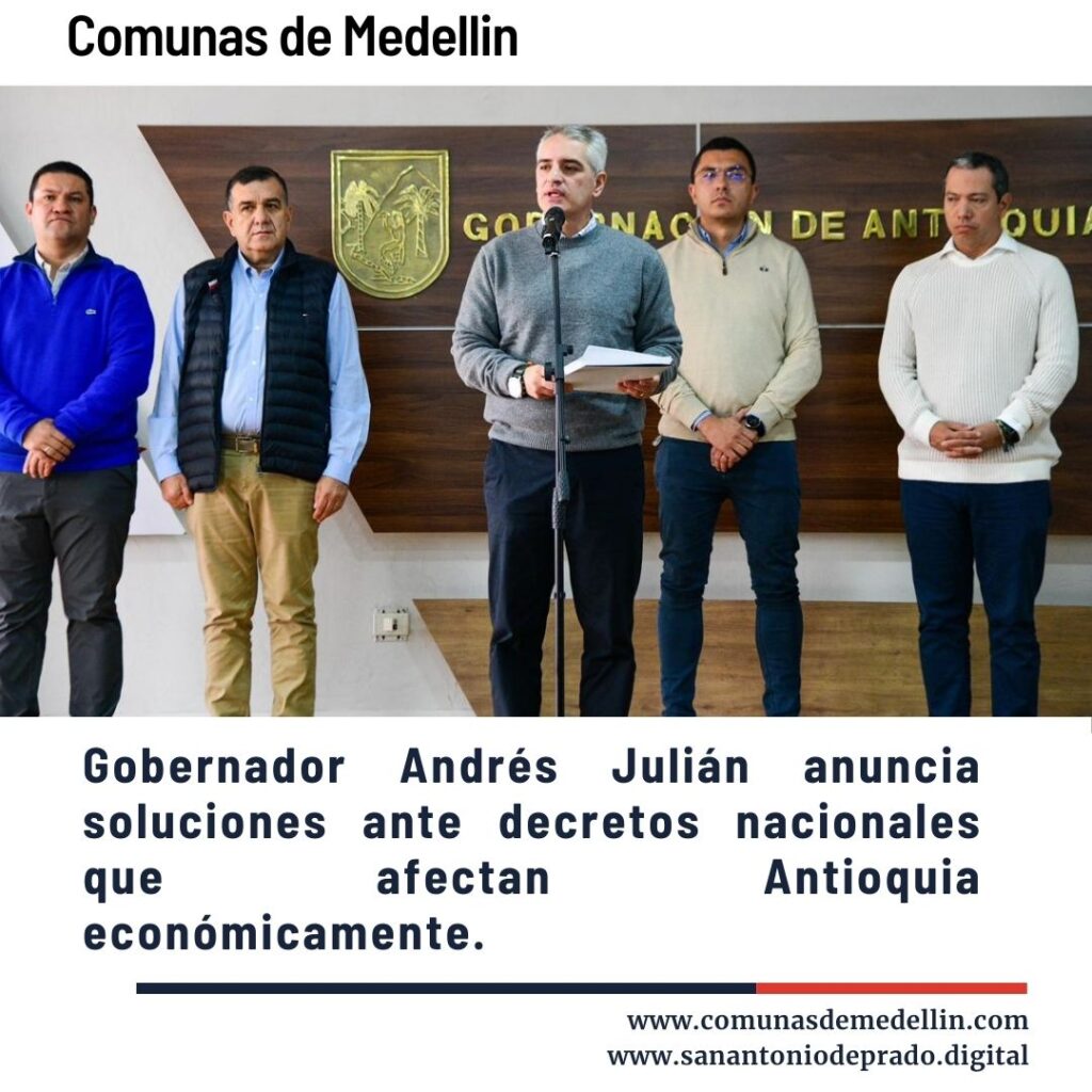Funcionarios y líderes en conferencia de prensa sobre impacto de 1.5 billones en Antioquia por emergencia económica y alza salarial del Gobierno nacional, fondo con escudo de Gobernación - Comunas de Medellín.
