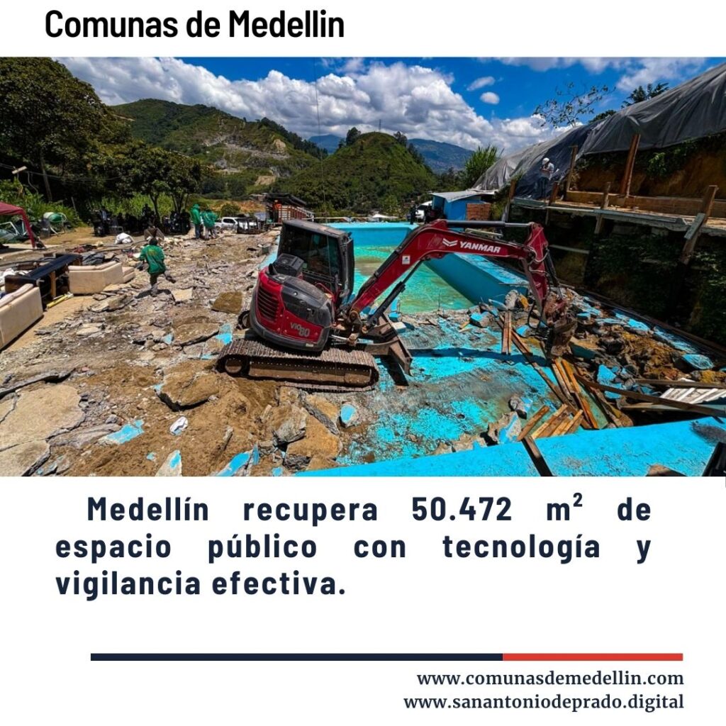 Escena de recuperación de espacio público en Medellín con excavadora Yanmar demoliendo estructura azul, trabajadores en sitio montañoso, texto 'Medellín recupera 50.472 m² de espacio público con tecnología y vigilancia efectiva' - Comunas de Medellín.